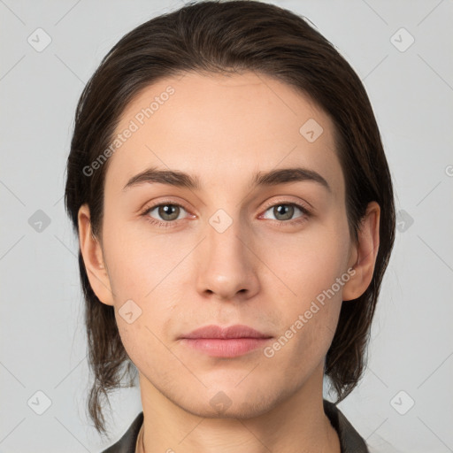 Neutral white young-adult female with medium  brown hair and brown eyes