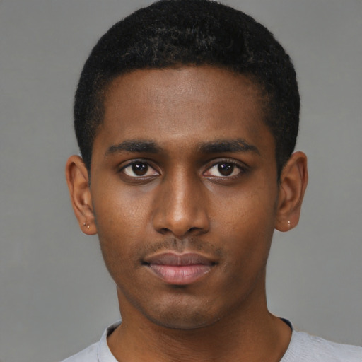 Neutral latino young-adult male with short  brown hair and brown eyes
