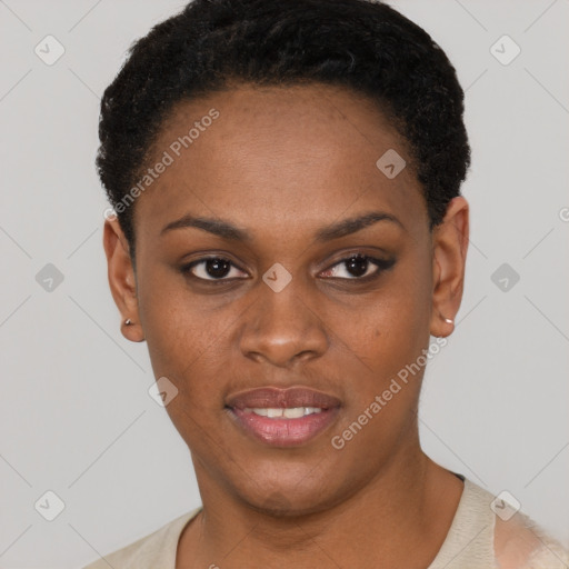 Joyful black young-adult female with short  brown hair and brown eyes