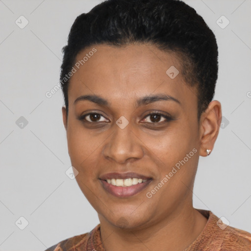 Joyful black young-adult female with short  black hair and brown eyes
