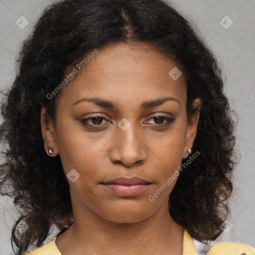 Joyful black young-adult female with medium  brown hair and brown eyes