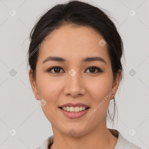 Joyful asian young-adult female with medium  brown hair and brown eyes