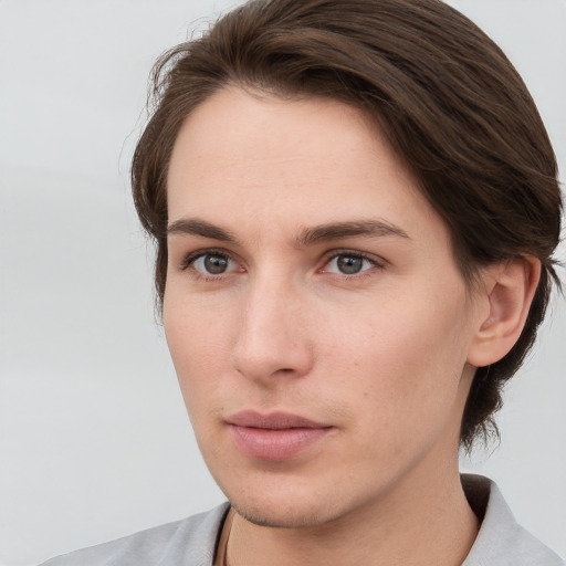 Neutral white young-adult female with medium  brown hair and grey eyes