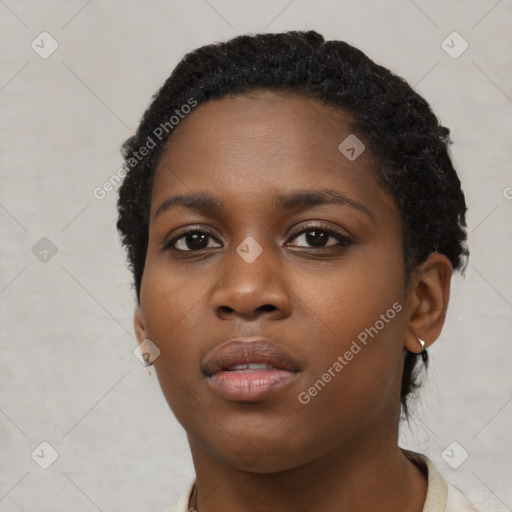 Neutral black young-adult female with short  black hair and brown eyes