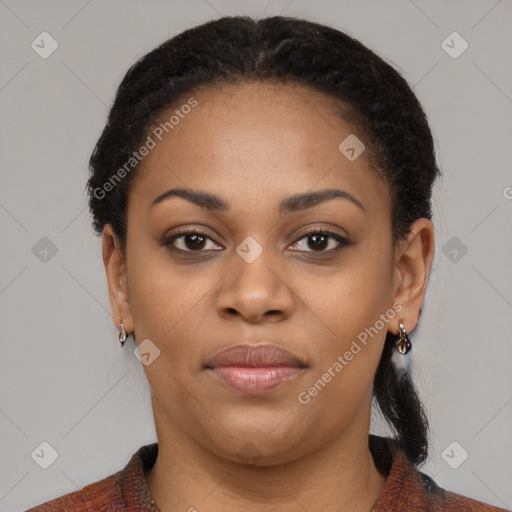 Joyful black young-adult female with medium  black hair and brown eyes