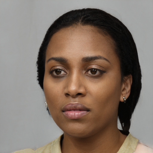 Neutral black young-adult female with long  black hair and brown eyes