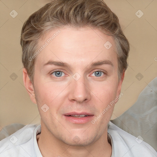 Joyful white adult male with short  brown hair and grey eyes