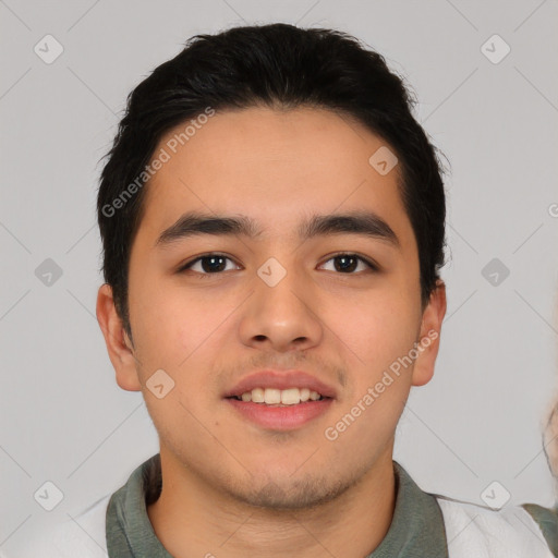 Joyful white young-adult male with short  black hair and brown eyes