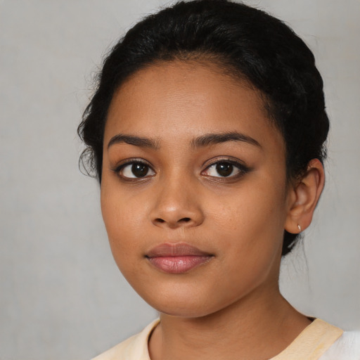 Neutral latino young-adult female with medium  brown hair and brown eyes
