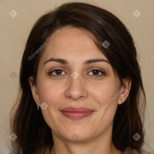 Joyful white adult female with medium  brown hair and brown eyes