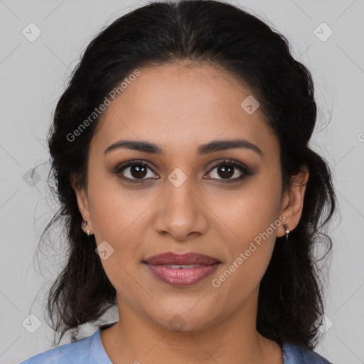 Joyful latino young-adult female with medium  brown hair and brown eyes