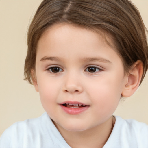 Joyful white child female with short  brown hair and brown eyes