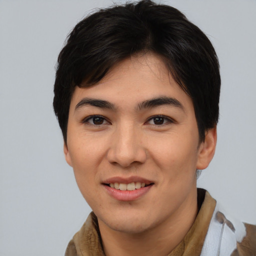 Joyful asian young-adult female with short  brown hair and brown eyes