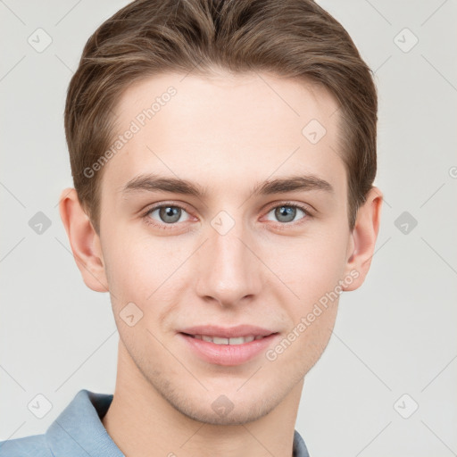 Joyful white young-adult male with short  brown hair and grey eyes