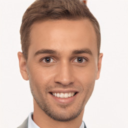 Joyful white young-adult male with short  brown hair and brown eyes