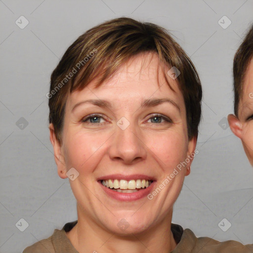 Joyful white adult female with short  brown hair and brown eyes