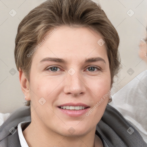 Joyful white young-adult female with short  brown hair and grey eyes