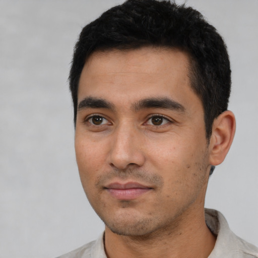 Neutral latino young-adult male with short  black hair and brown eyes