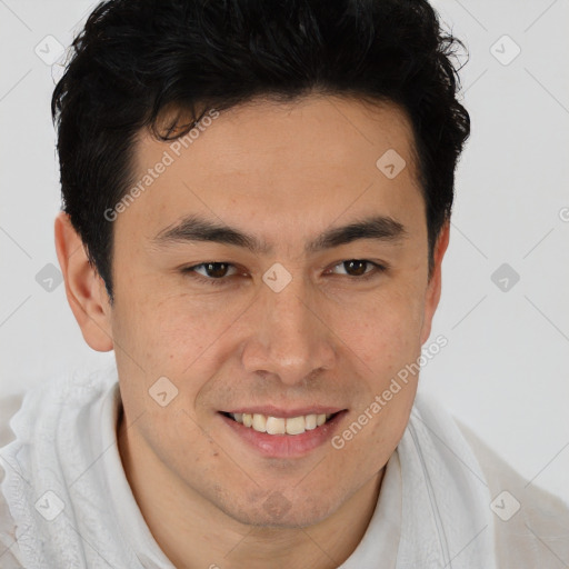 Joyful asian young-adult male with short  brown hair and brown eyes