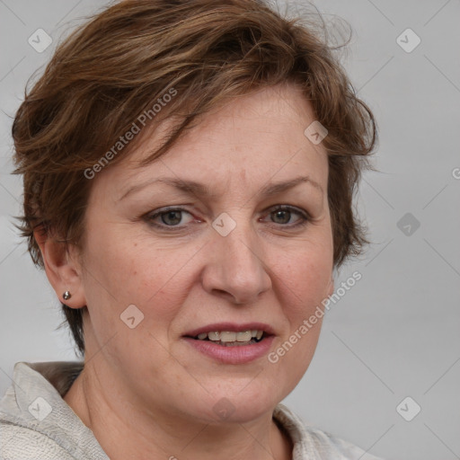 Joyful white adult female with medium  brown hair and blue eyes