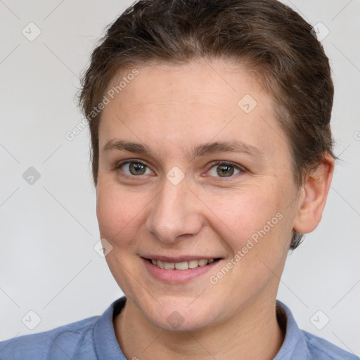 Joyful white young-adult female with short  brown hair and brown eyes