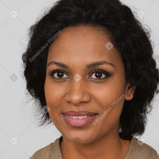 Joyful black young-adult female with long  brown hair and brown eyes