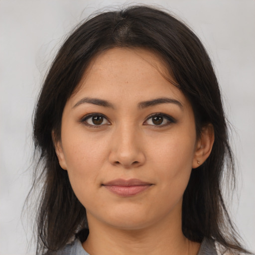 Neutral latino young-adult female with medium  brown hair and brown eyes