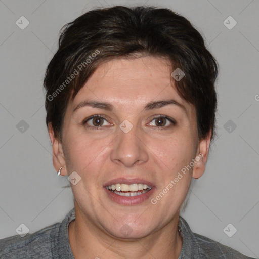 Joyful white adult female with short  brown hair and brown eyes