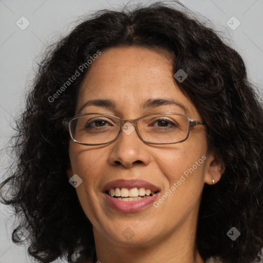 Joyful white adult female with long  brown hair and brown eyes