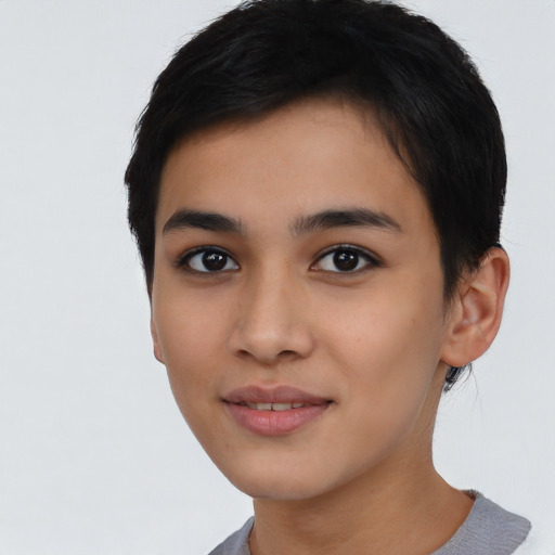 Joyful asian young-adult female with short  black hair and brown eyes