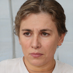 Neutral white adult female with short  brown hair and brown eyes