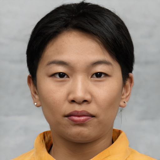 Neutral asian young-adult female with short  brown hair and brown eyes