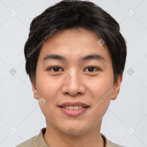 Joyful asian young-adult male with short  brown hair and brown eyes