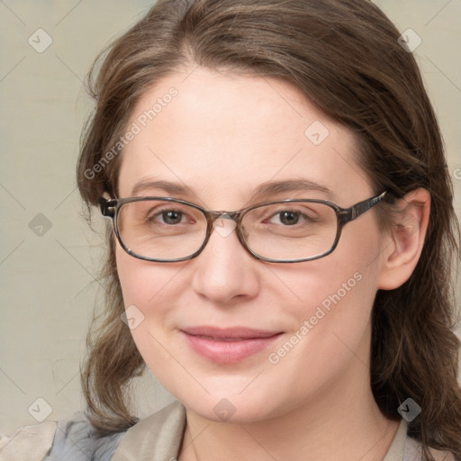 Joyful white young-adult female with medium  brown hair and blue eyes