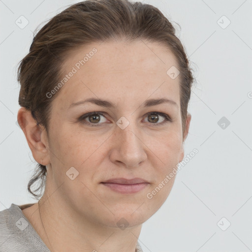 Joyful white adult female with short  brown hair and grey eyes