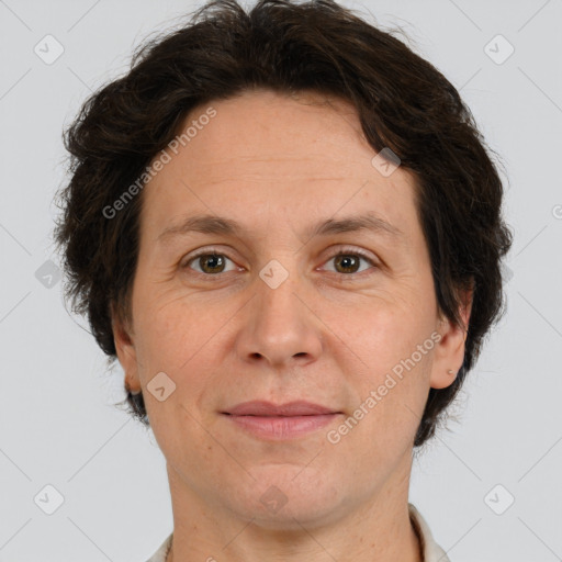 Joyful white adult female with short  brown hair and brown eyes