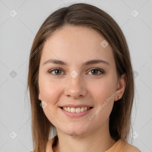 Joyful white young-adult female with medium  brown hair and brown eyes