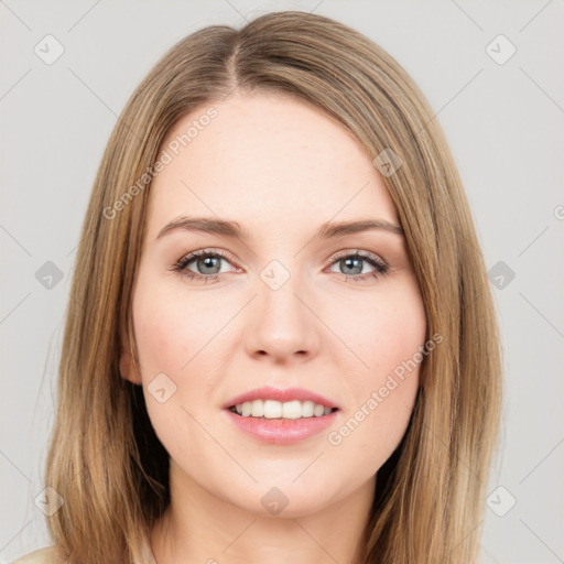 Joyful white young-adult female with long  brown hair and green eyes