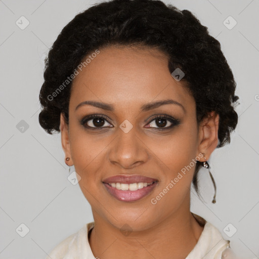 Joyful black young-adult female with short  black hair and brown eyes