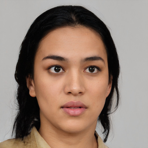 Neutral white young-adult female with medium  black hair and brown eyes
