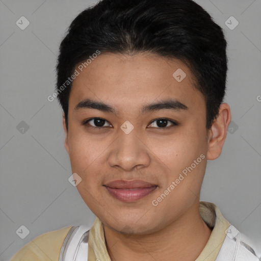 Joyful white young-adult male with short  black hair and brown eyes