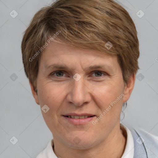 Joyful white adult female with short  brown hair and brown eyes