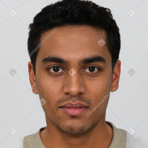 Neutral latino young-adult male with short  black hair and brown eyes