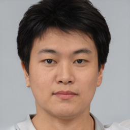 Neutral asian young-adult male with short  brown hair and brown eyes