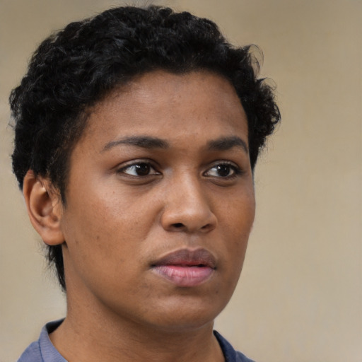 Neutral black young-adult female with short  brown hair and brown eyes