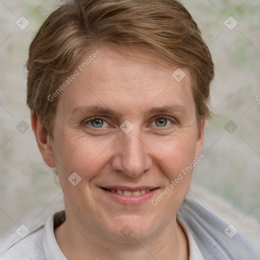 Joyful white adult female with short  brown hair and grey eyes