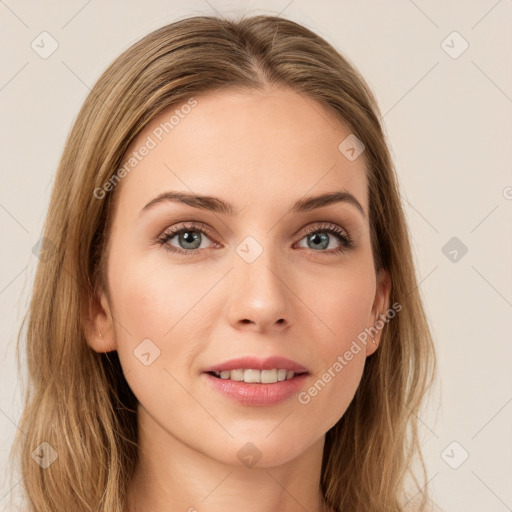 Joyful white young-adult female with long  brown hair and green eyes