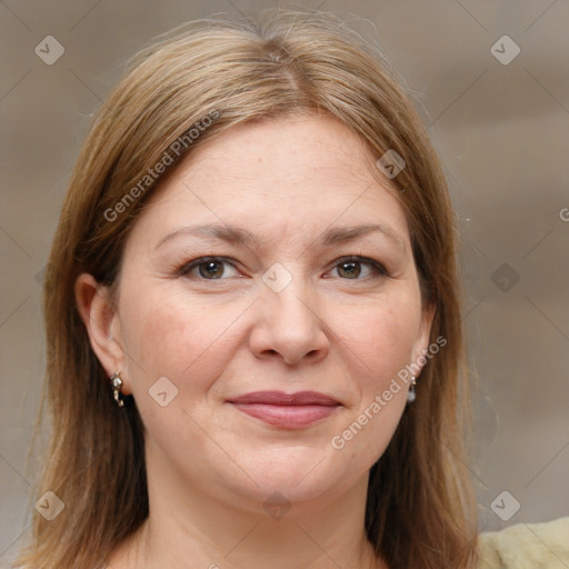 Joyful white adult female with medium  brown hair and brown eyes