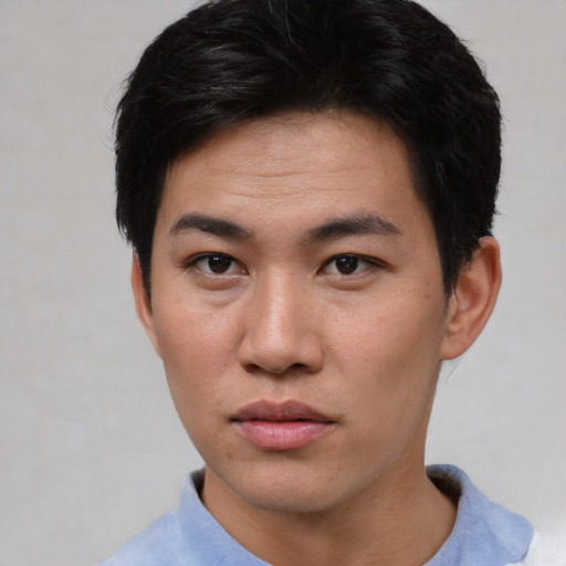 Neutral asian young-adult male with short  brown hair and brown eyes