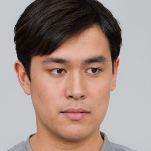 Neutral asian young-adult male with short  brown hair and brown eyes